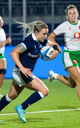 EDINBURGH, SCOTLAND - SEPTEMBER 06: Scotland's Chloe Rollie breaks through for her 2nd try during an Autumn Test match between Scotland and Wales at the Hive Stadium, on September 06, 2024, in Edinburgh, Scotland. (Photo by Ross Parker / SNS Group)